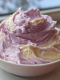 Fluffy, swirled Whipped Japanese Sweet Potatoes Coconut Milk in a white bowl.